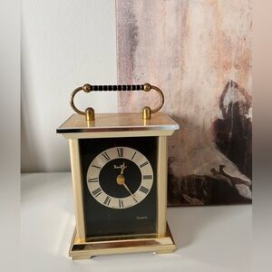 A vintage Thankart quartz carriage-style desk clock